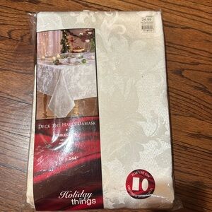 NWT Tablecloth in Ivory. Deck the Halls Damask. 70” x 144” Oblong